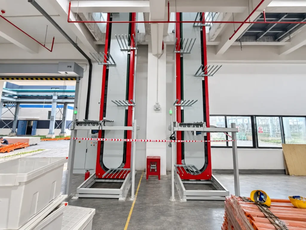 Multi-Station Vertical Transfer for Reusable Totes